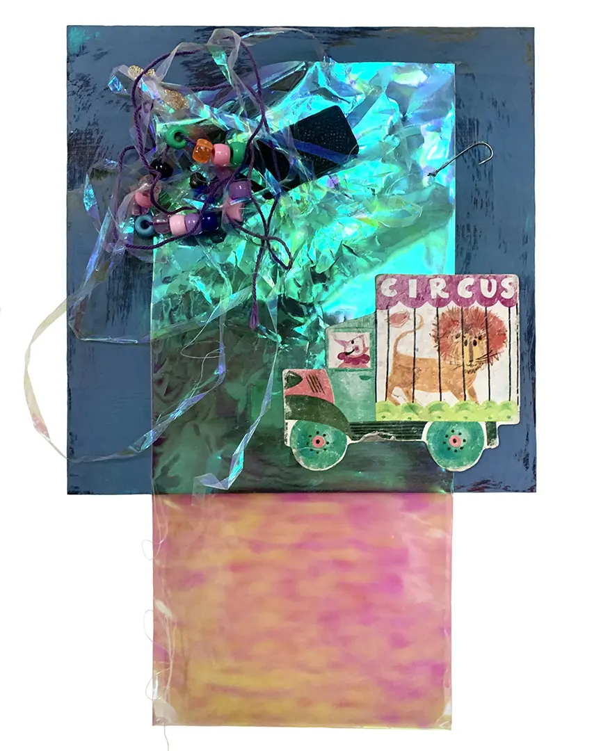 Front view of a three-dimensional collage on a painted board. It's made of miscellaneous 
                    trash, including strings of beads, plastic, and a circus cutout from a children's book.